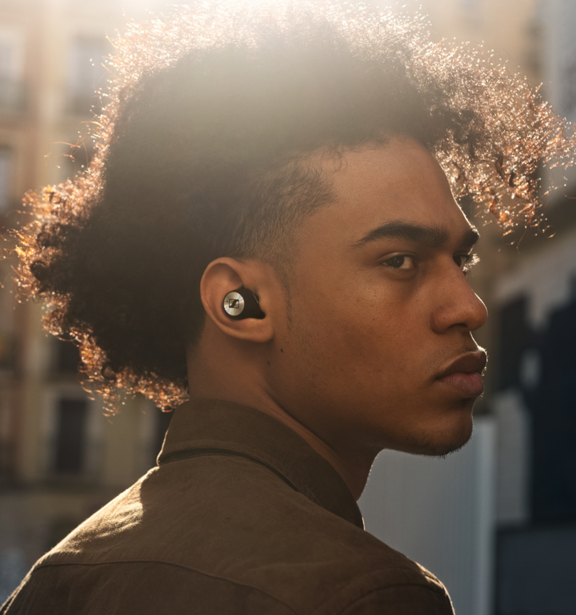 Man wearing MOMENTUM True Wireless 2